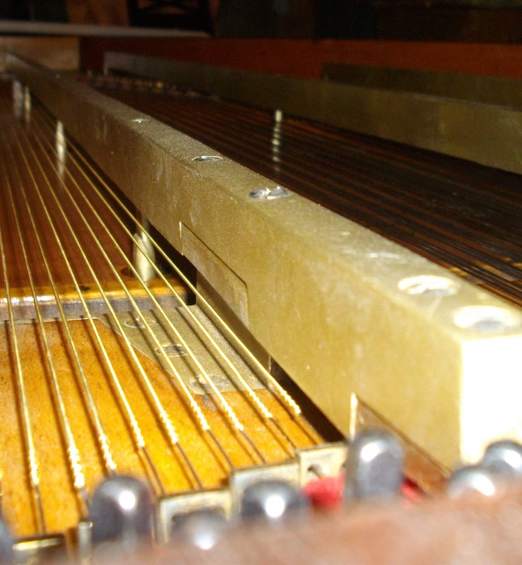 Photo de réparation d'un piano Erard